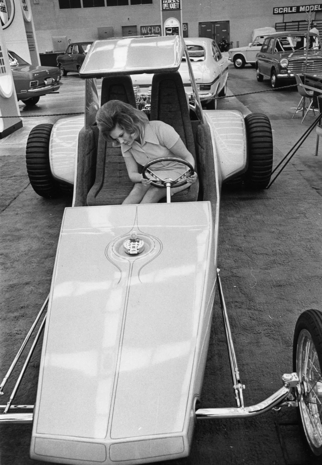 Beverly Klemola checks out a sand buggy in Detroit